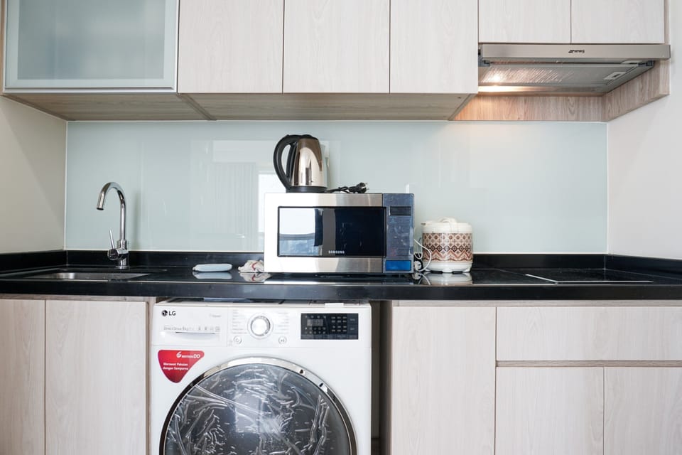 Fridge, stovetop, cookware/dishes/utensils, dining tables