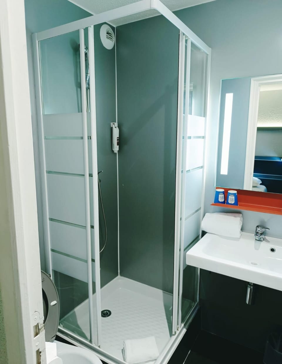 Shower, eco-friendly toiletries, hair dryer, towels