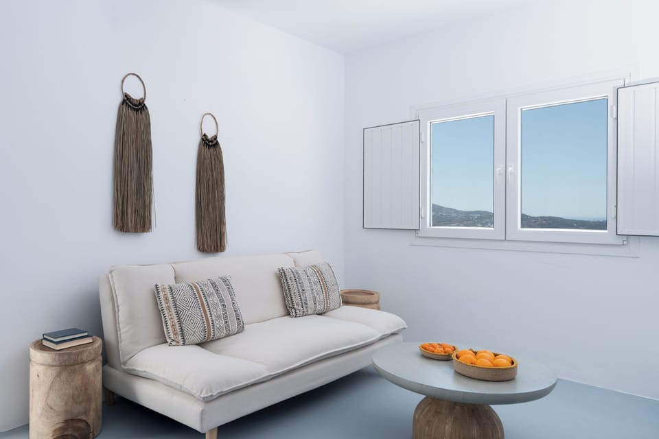 Majestic Suite (Outdoor Hot Tub - Caldera View) | Living area | Flat-screen TV
