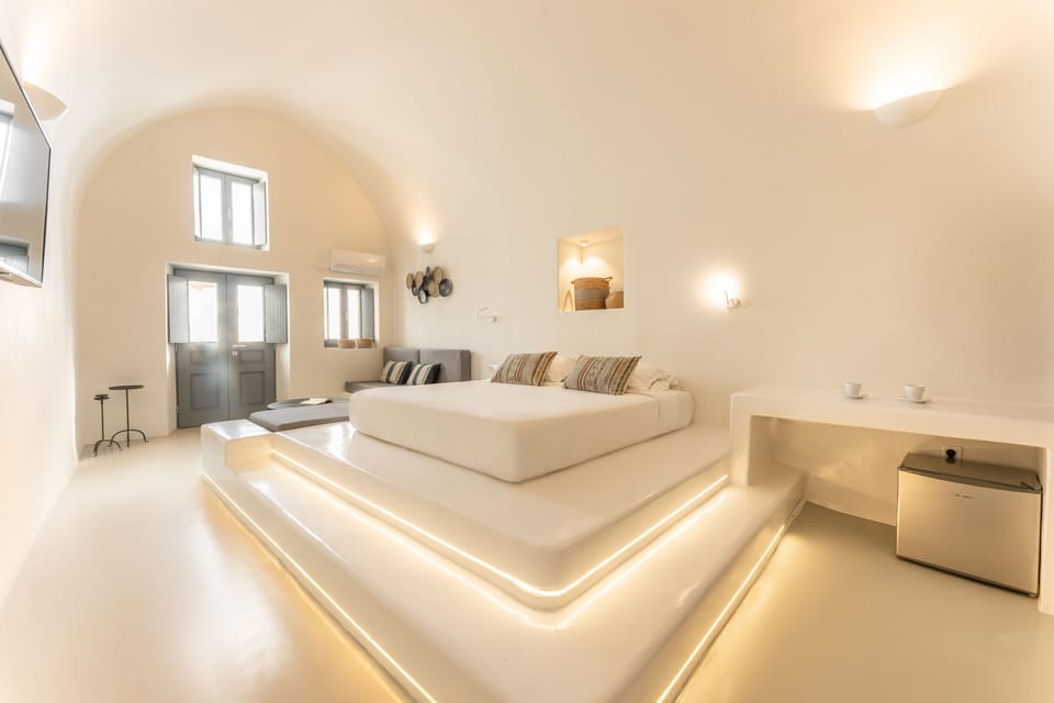 Master Suite - Private Terrace (Outdoor Hot Tub - Caldera View) | Minibar, in-room safe, individually decorated, individually furnished