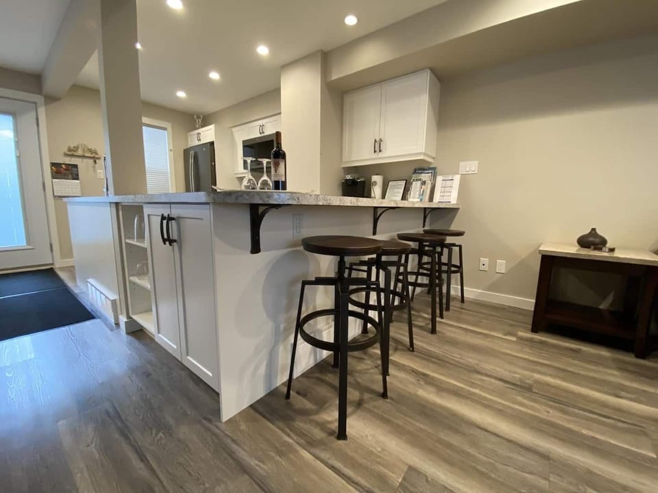 This unit has recently been rebuilt.  It really is brand new and looks awesome.  A great space to prepare those memorable meals whilst not missing out on the family fun.