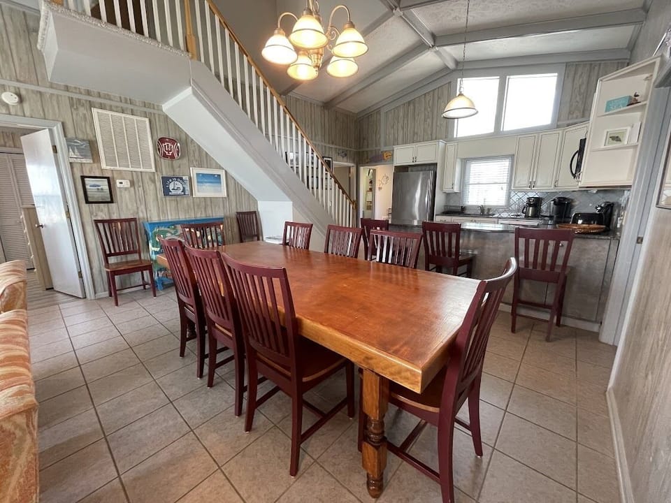 Large dining table and bar seating