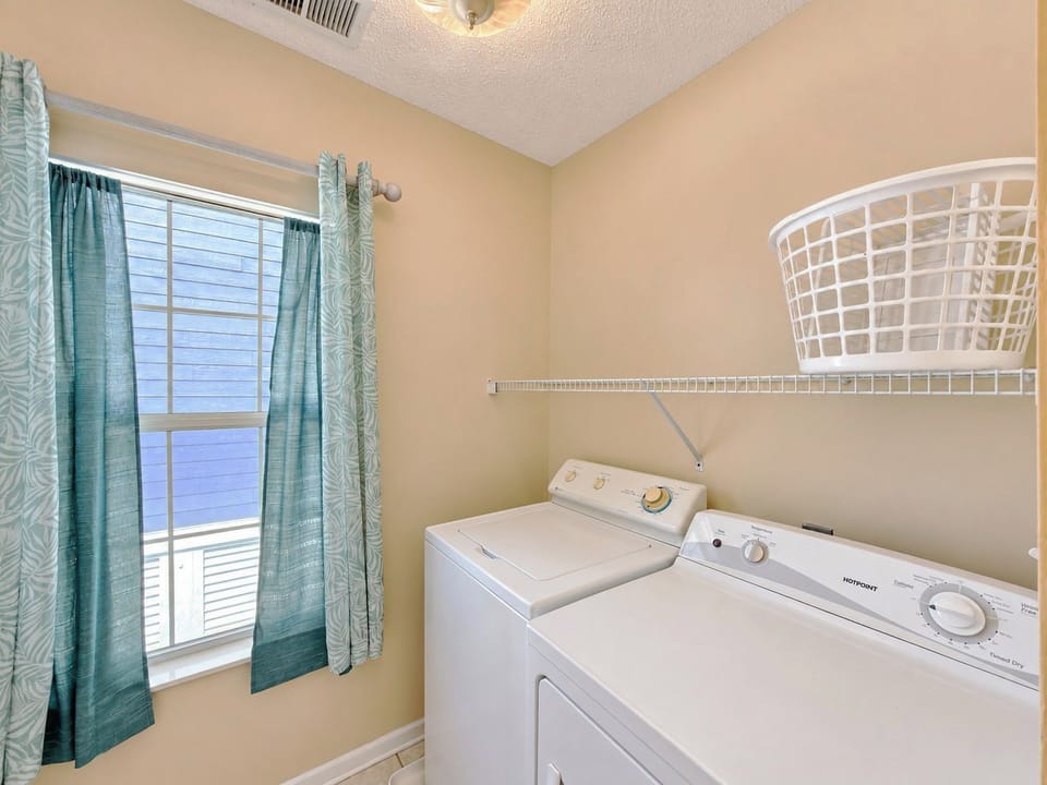 Laundry located in downstairs bathroom.