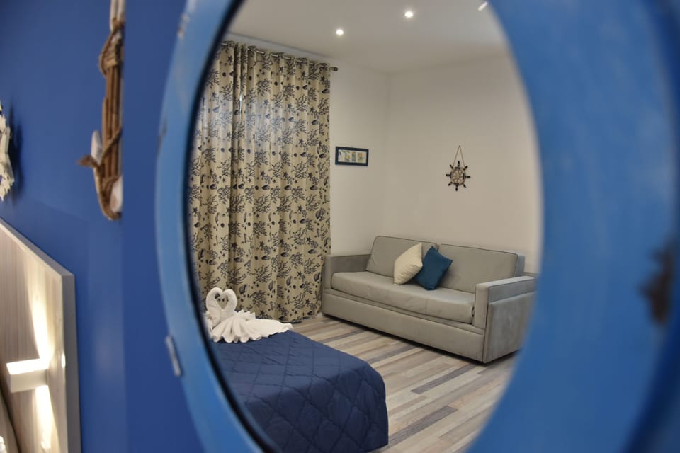 Triple Room, Private Bathroom | In-room safe, desk, free WiFi