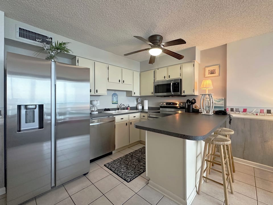 Lots of prep space and countertop seating.