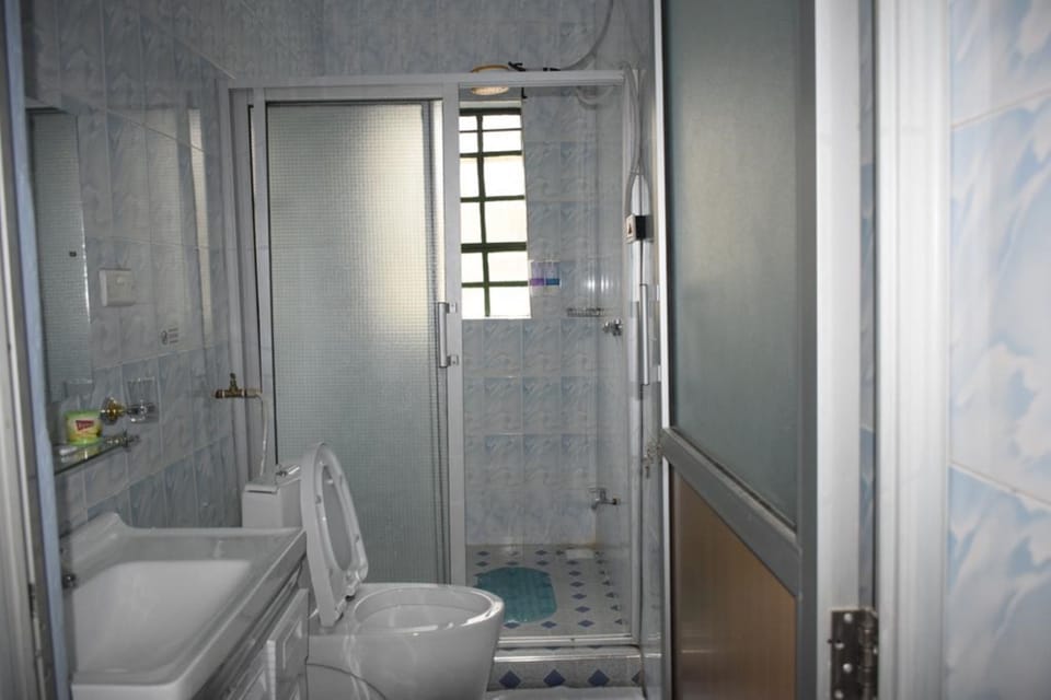 Shower, free toiletries, towels, soap