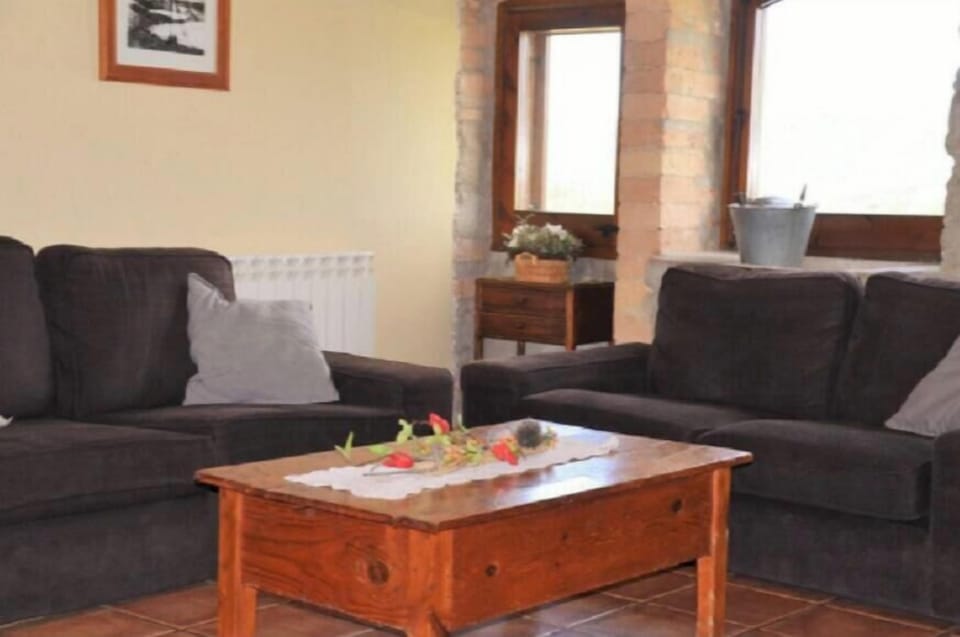 CASA CISERO has a big living room with sofa corner an TV