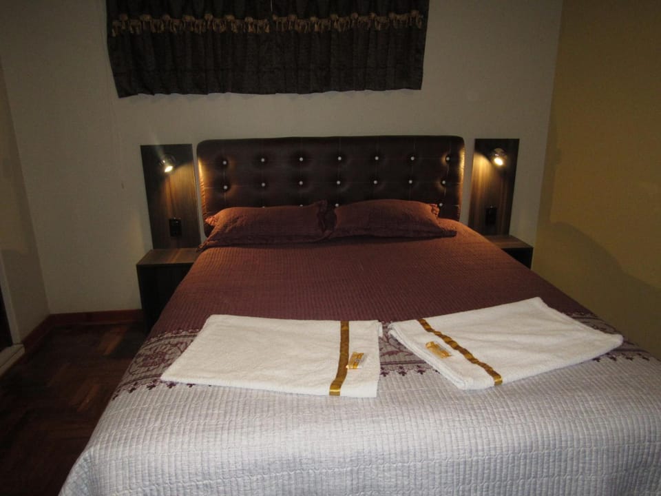 Desk, laptop workspace, free WiFi, bed sheets