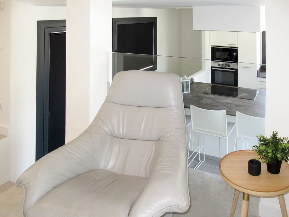 Furniture, Room, Property, Living Room, Chair, Interior Design, Couch, Floor, House, Wall