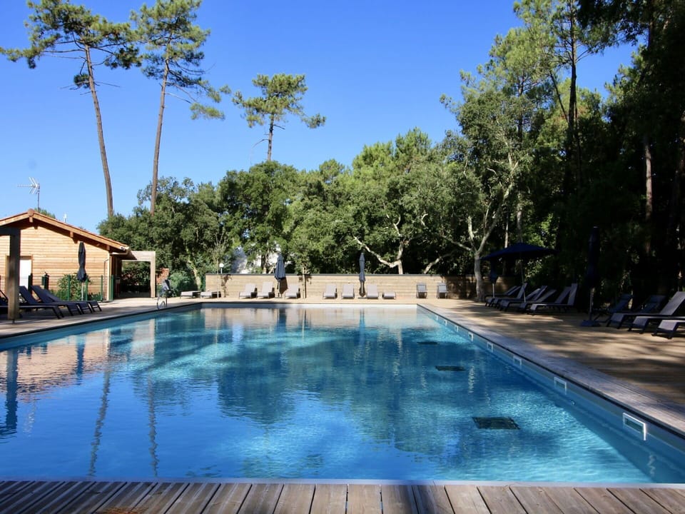 Water, Sky, Property, Plant, Swimming Pool, Azure, Tree, Body Of Water, Natural Landscape, Leisure