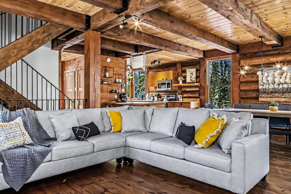Our spacious main level is designed for togetherness, with a deep sectional sofa perfect for group movie nights or long chats.