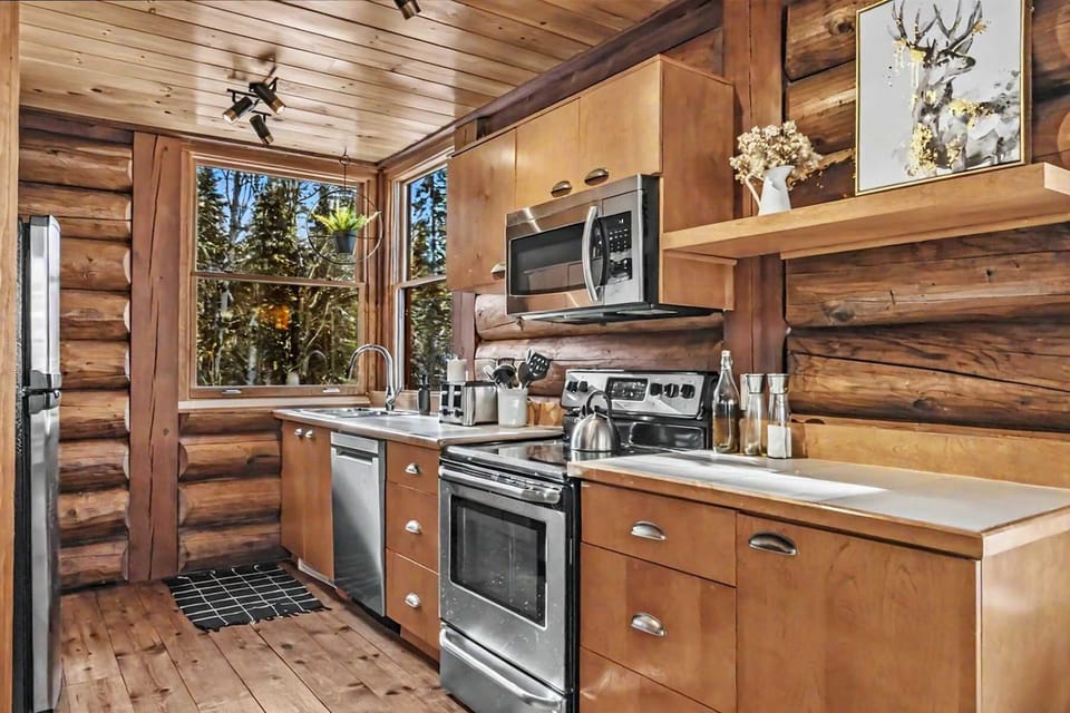 A chef’s delight. This gourmet kitchen is fully equipped with stainless steel appliances and all the tools needed for holiday feasts.