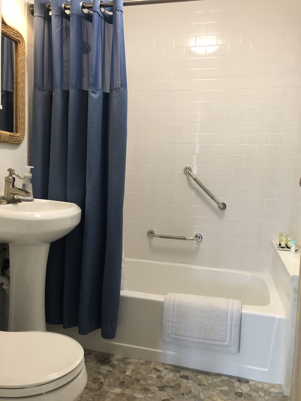 Bathroom. Shower-tub. Per guest request,  support handles added October, 2020.