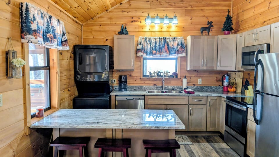 All new kitchen cabinets and granite countertop with seating for 6 
 