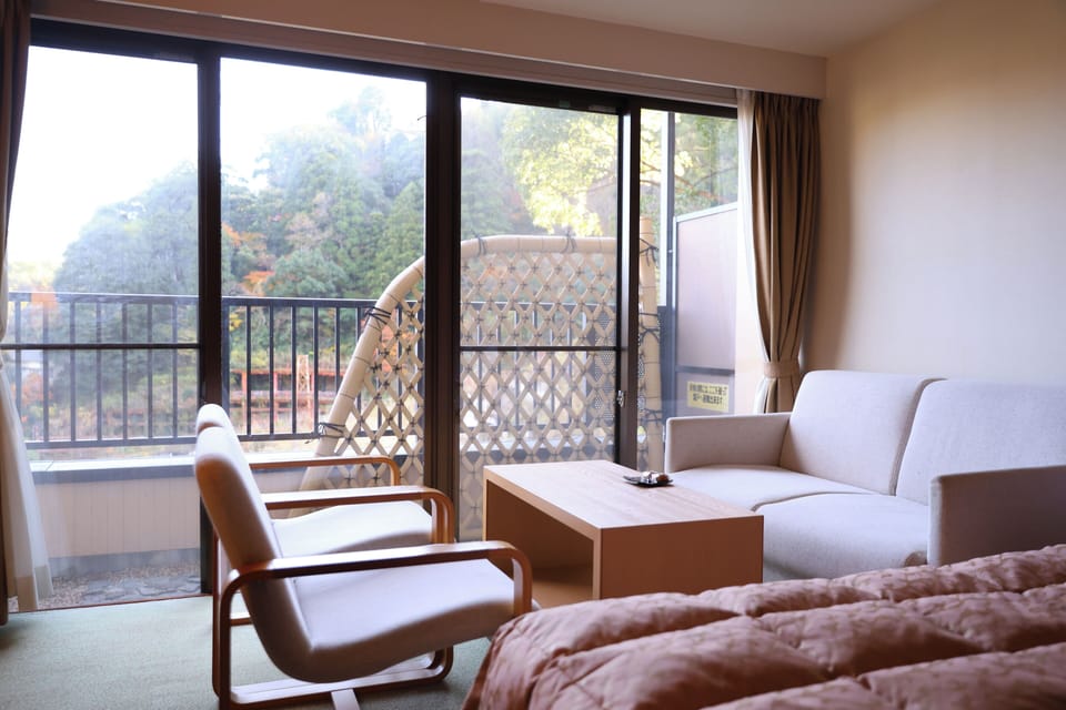 Standard Twin Room with Sofa, Non Smoking | In-room safe, laptop workspace, blackout drapes, free WiFi