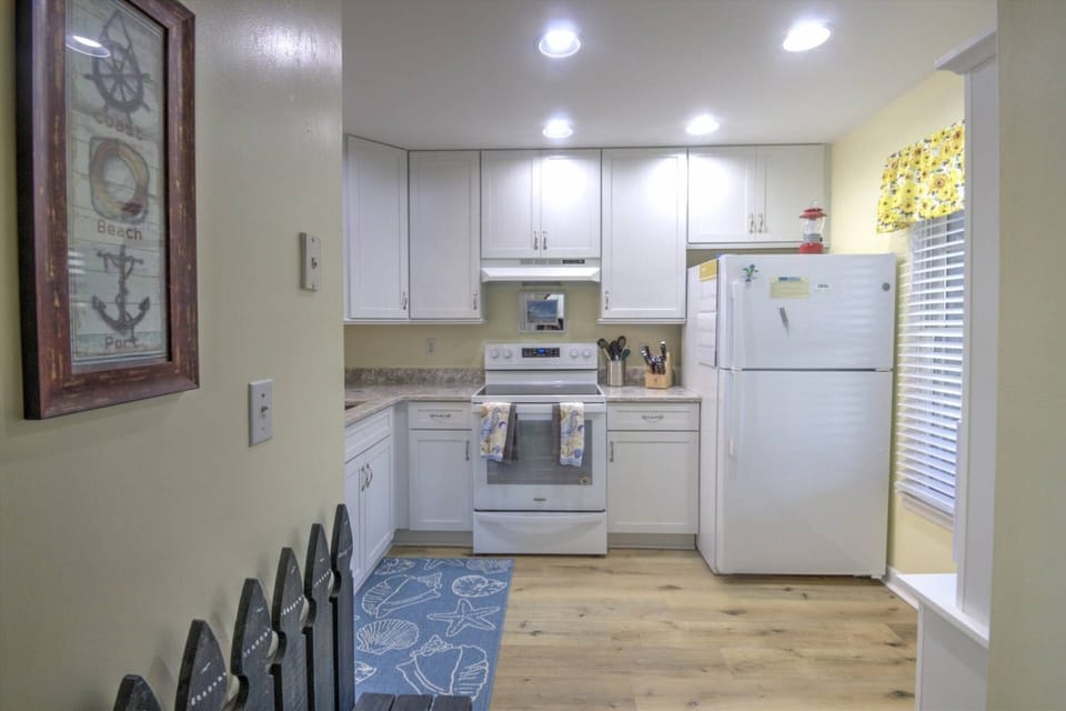 This kitchen has all essentials to cook for six people.