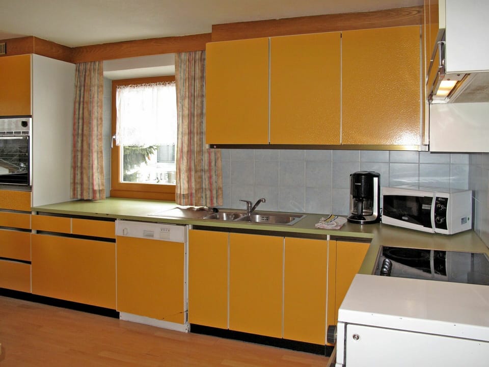 Countertop, Cabinetry, Kitchen, Room, Furniture, Property, Kitchen Stove, Interior Design, Cupboard, Building