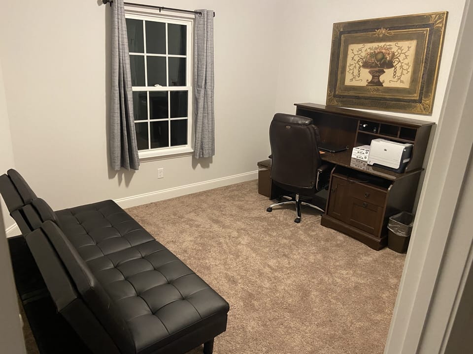 4th bedroom with office and a Futon