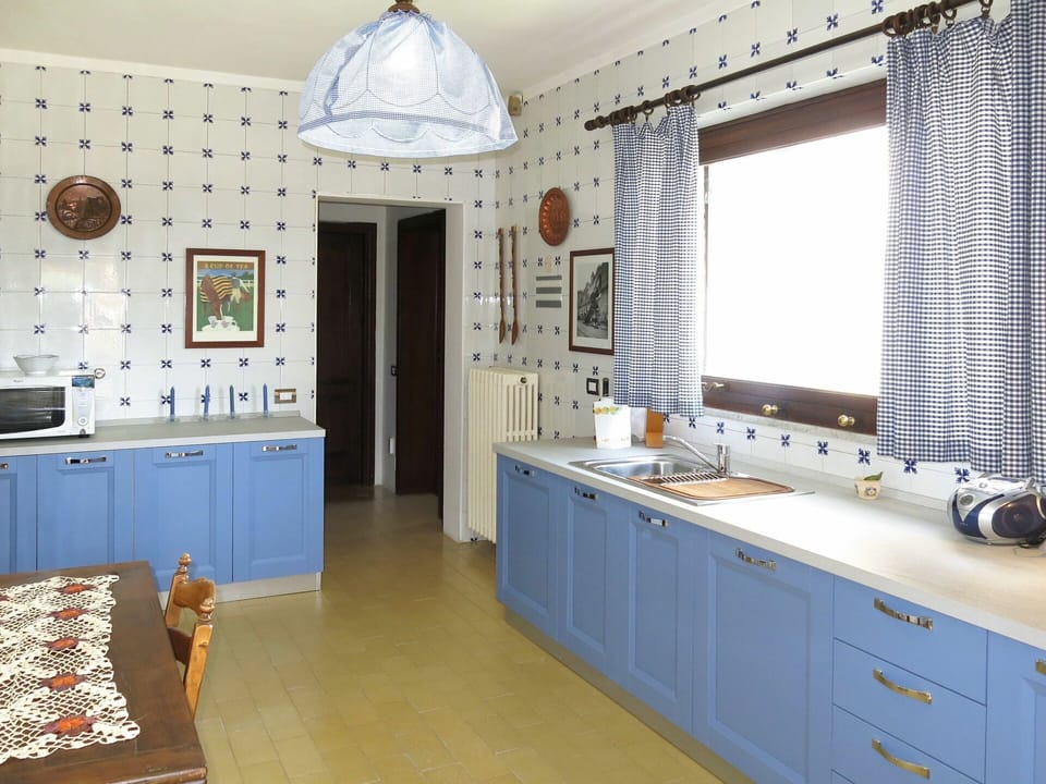 Room, Property, Blue, Furniture, Kitchen, Countertop, Interior Design, Building, Cabinetry, Wall