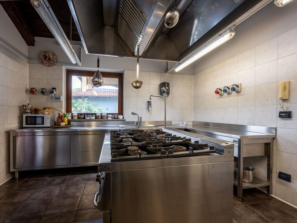 Cabinetry, Countertop, Kitchen, Kitchen Stove, Interior Design, Kitchen Appliance, Sink, House, Wood, Gas Stove