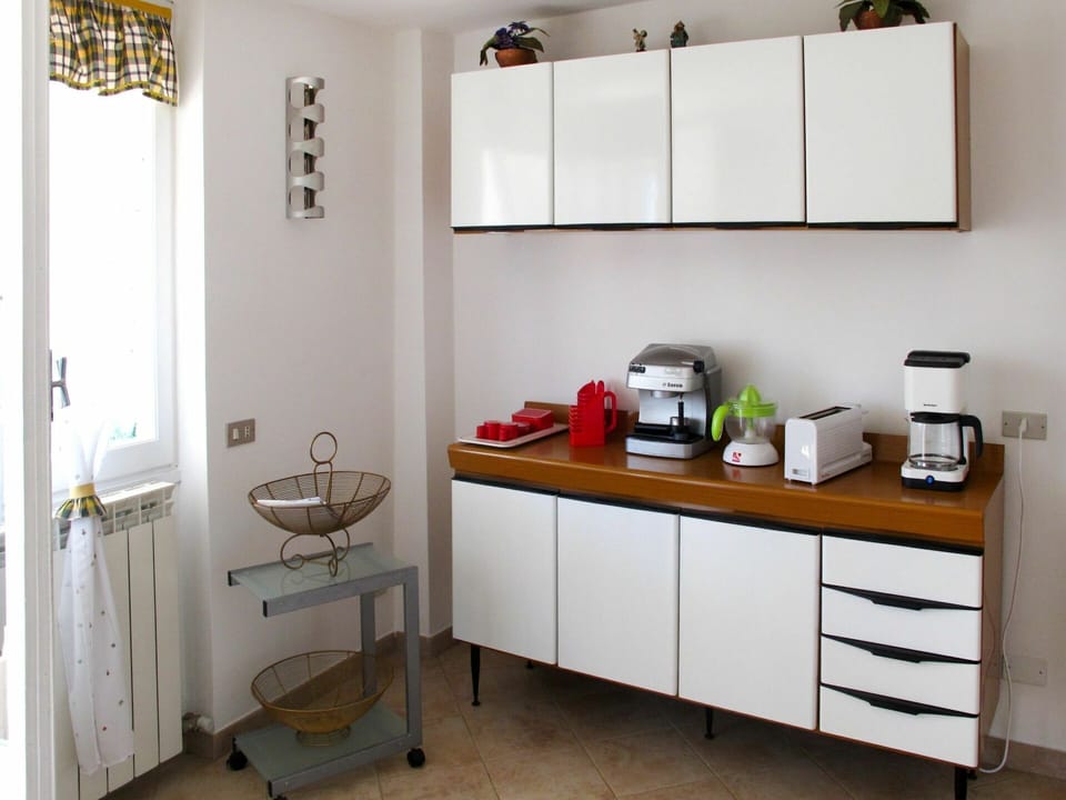 Room, Furniture, Property, Shelf, Interior Design, Cabinetry, Building, Floor, Kitchen, Architecture