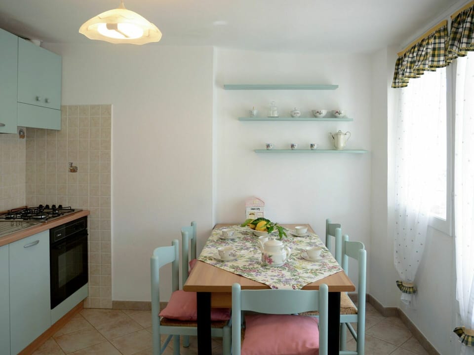 Room, Furniture, Property, Interior Design, Ceiling, Building, Floor, House, Kitchen, Yellow