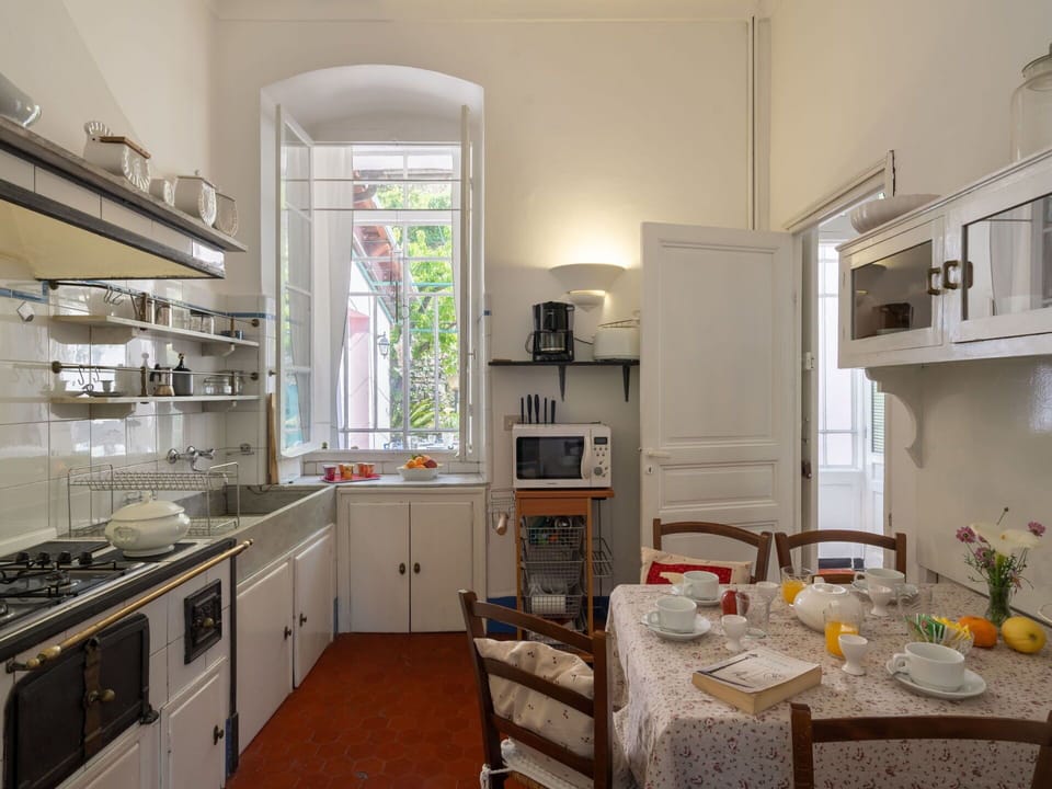 Furniture, Interior Design, Flooring, Kitchen, Kitchen Appliance, Countertop, Home, Cabinetry, Lighting, Room