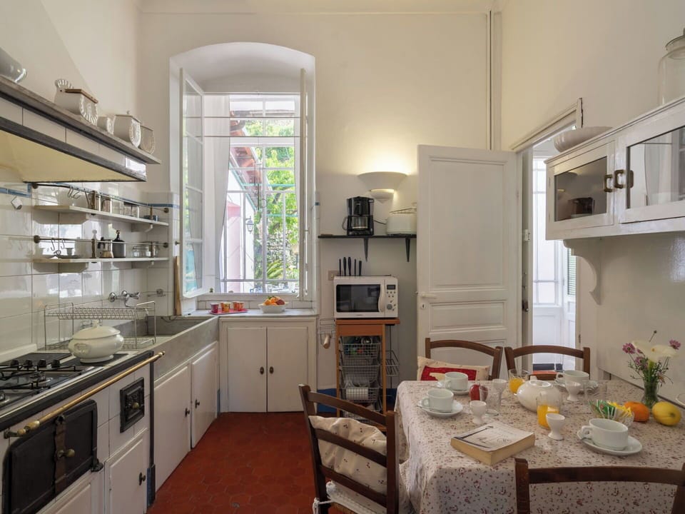 Cabinetry, Furniture, Property, Countertop, Table, Kitchen Appliance, Kitchen Stove, Kitchen, Home Appliance, Sink