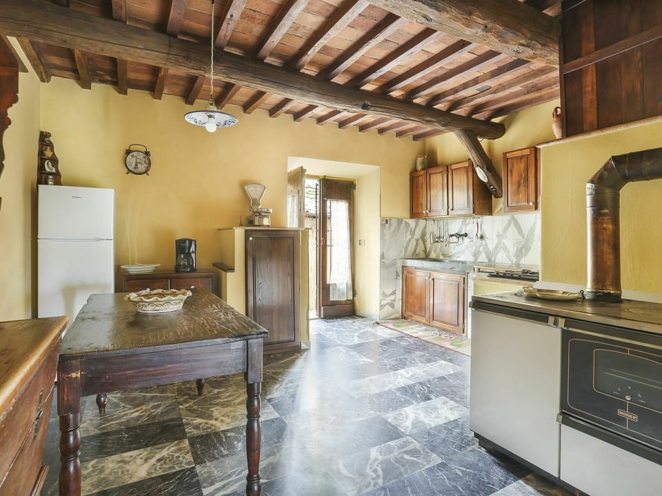 Property, Cabinetry, Furniture, Table, Countertop, Wood, Lighting, Interior Design, Drawer, Door