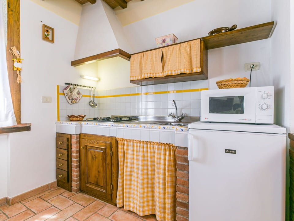 Cabinetry, Countertop, Property, Kitchen, Kitchen Appliance, Home Appliance, Wood, Kitchen Stove, Lighting, Sink