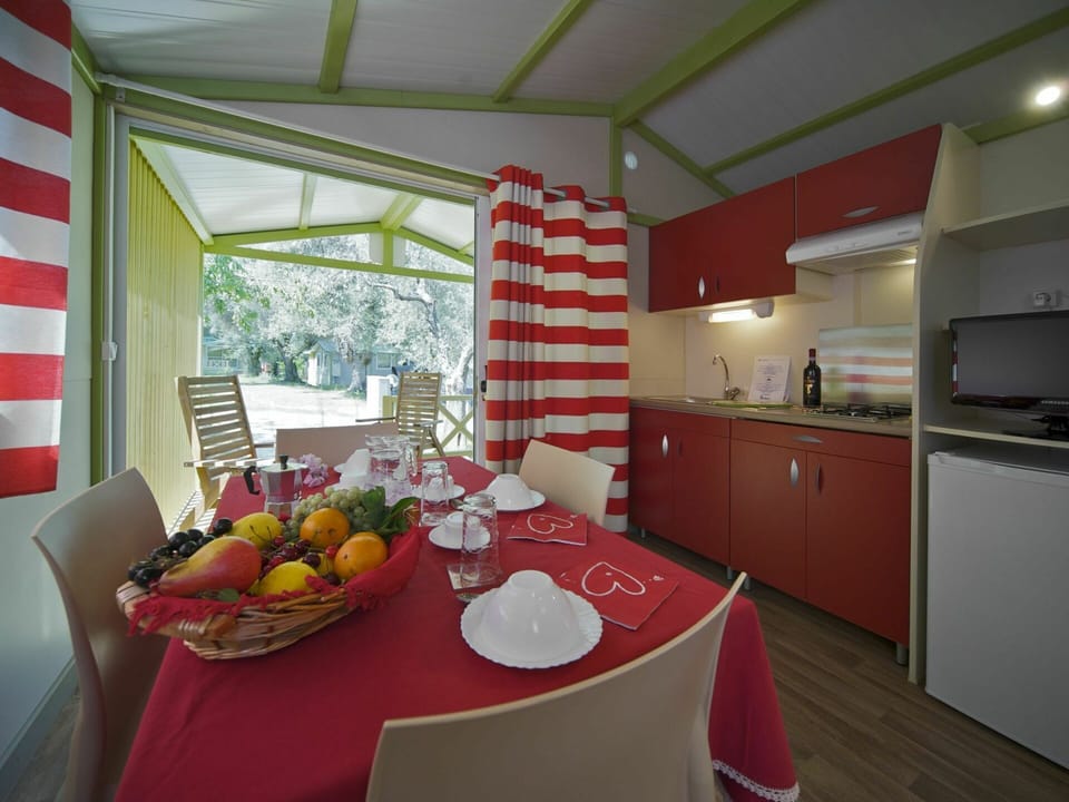Table, Furniture, Cabinetry, Countertop, Window, Tableware, Chair, Building, Orange, Interior Design