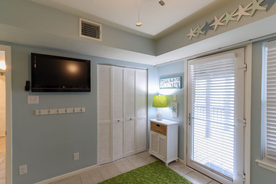 Pack n' play, highchair, and monitor stored in Bunk Room closet
