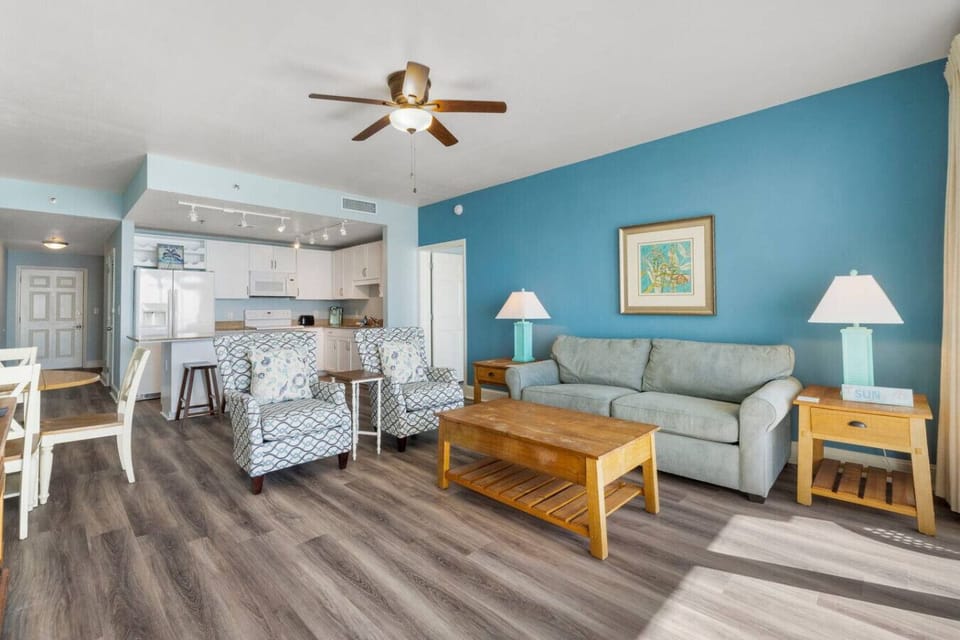 Living Area with Ocean Views, Flat Screen TV, Sleeper Sofa and Private Balcony Access