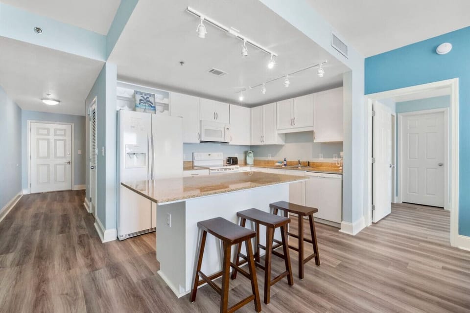 Full Size Kitchen with Ocean Views and Island Bar Seating