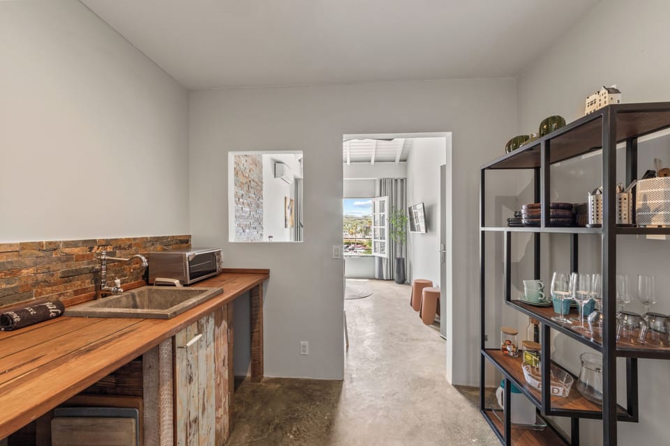 Urban Loft | Private kitchen | Full-size fridge, toaster, cleaning supplies