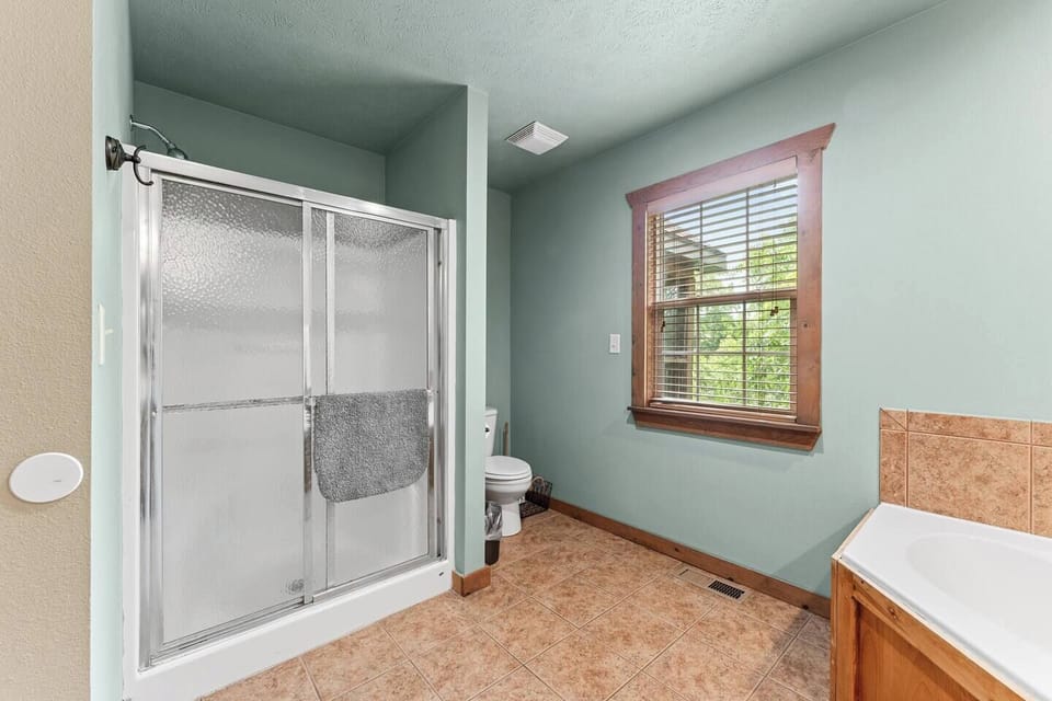 Master bath #1 with it's own standalone shower unit