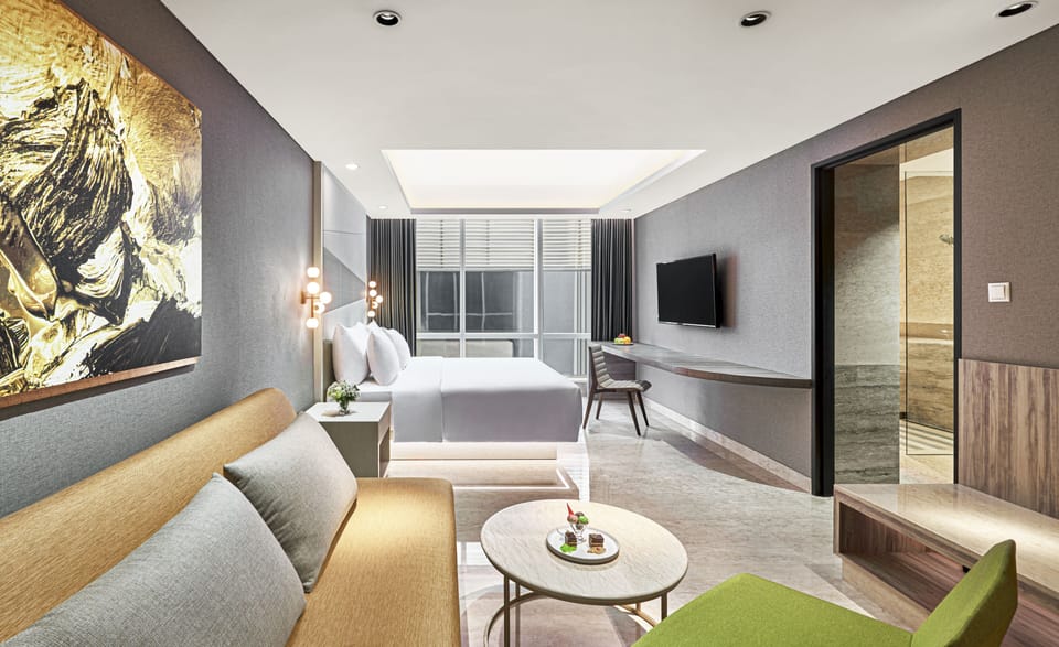 Junior Suite | Minibar, in-room safe, desk, iron/ironing board