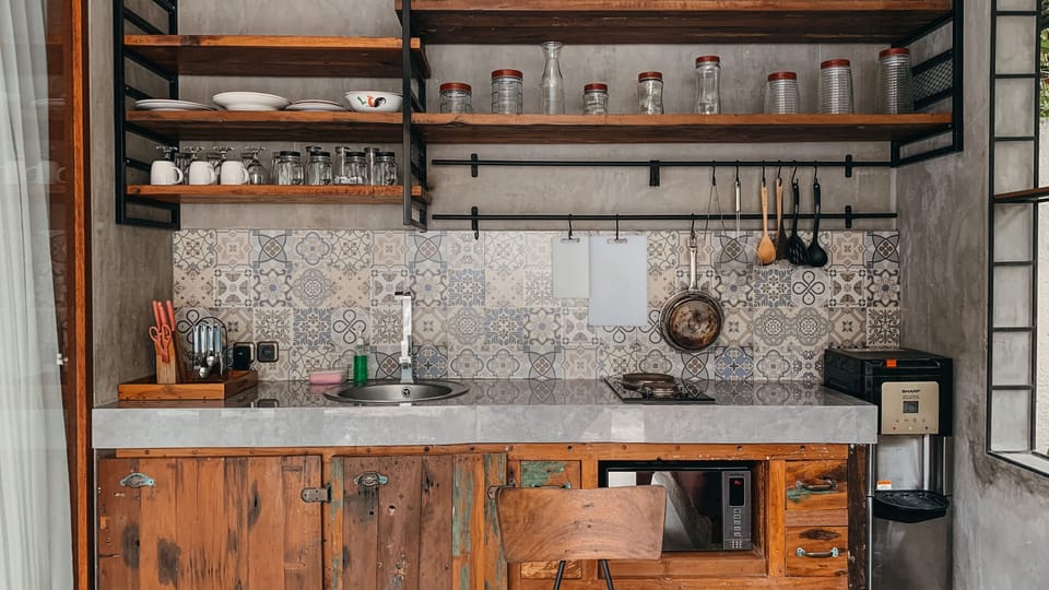 Deluxe Villa, 1 King Bed | Private kitchen | Mini-fridge, microwave, stovetop, dishwasher