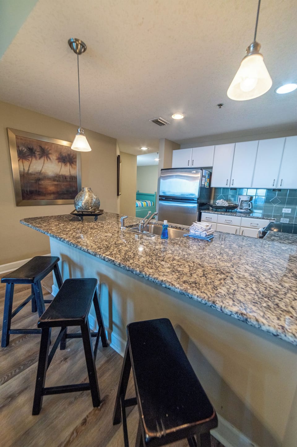 Additional seating for 3 at the bar area