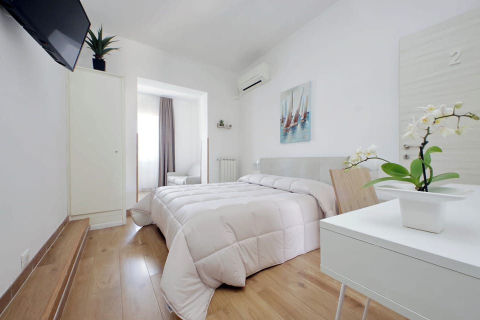 Family Quadruple Room | Premium bedding, individually decorated, individually furnished, desk