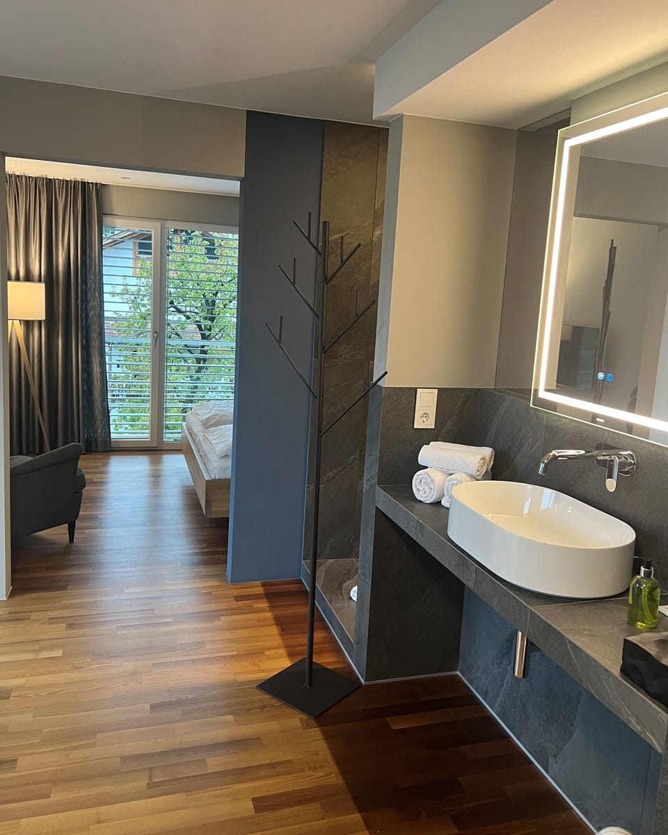 Suite, Non Smoking, Pool View | Hypo-allergenic bedding, minibar, in-room safe, individually decorated