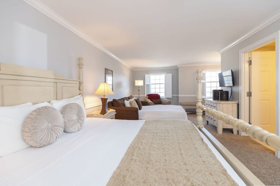 King Room King Bed with Queen Sleep Sofa | Individually decorated, individually furnished, desk, laptop workspace