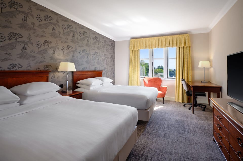 Family Room, 2 Double Beds | Premium bedding, down comforters, pillowtop beds, in-room safe