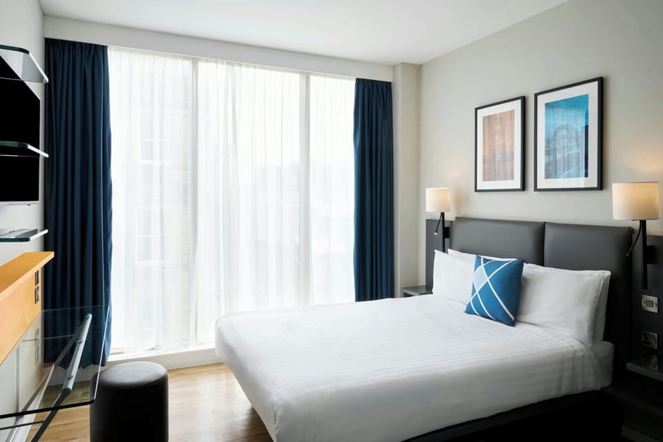 In-room safe, desk, blackout drapes, iron/ironing board