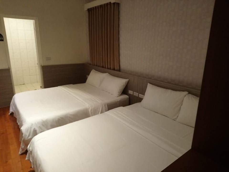 Standard Quadruple Room | Blackout drapes, free WiFi, bed sheets