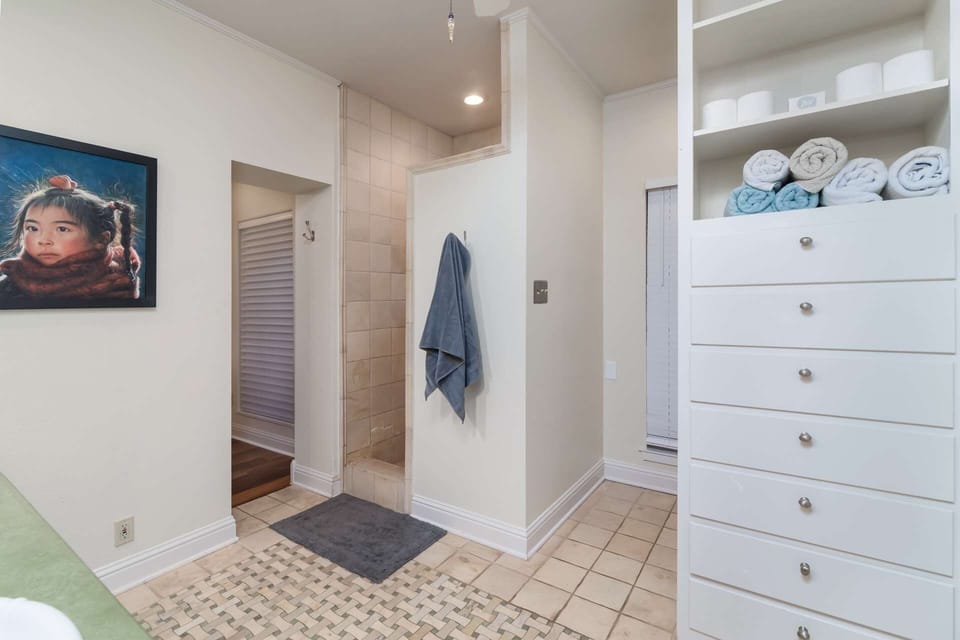 Master Bathroom has walk-in shower, and garden tub (next room) overlooking Lake Travis