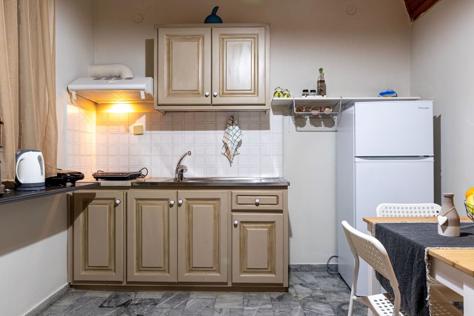 Apartment | Private kitchen | Fridge, stovetop, coffee/tea maker, electric kettle