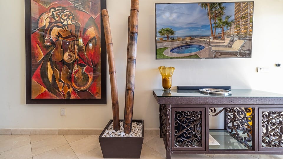 close up of the TV, and wall art