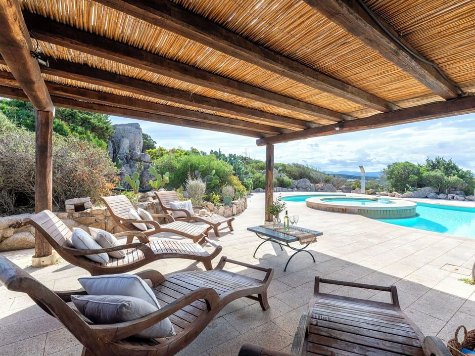 Furniture, Outdoor Furniture, Resort, Table, Outdoor Table, Swimming Pool, Chair, Shade, Deck, Patio