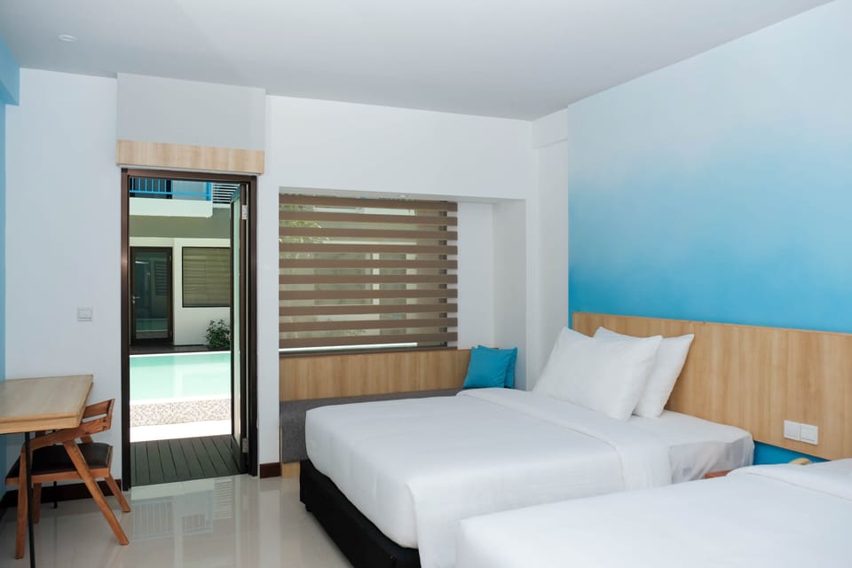 Deluxe Twin Room, Pool Access | Premium bedding, minibar, in-room safe, desk